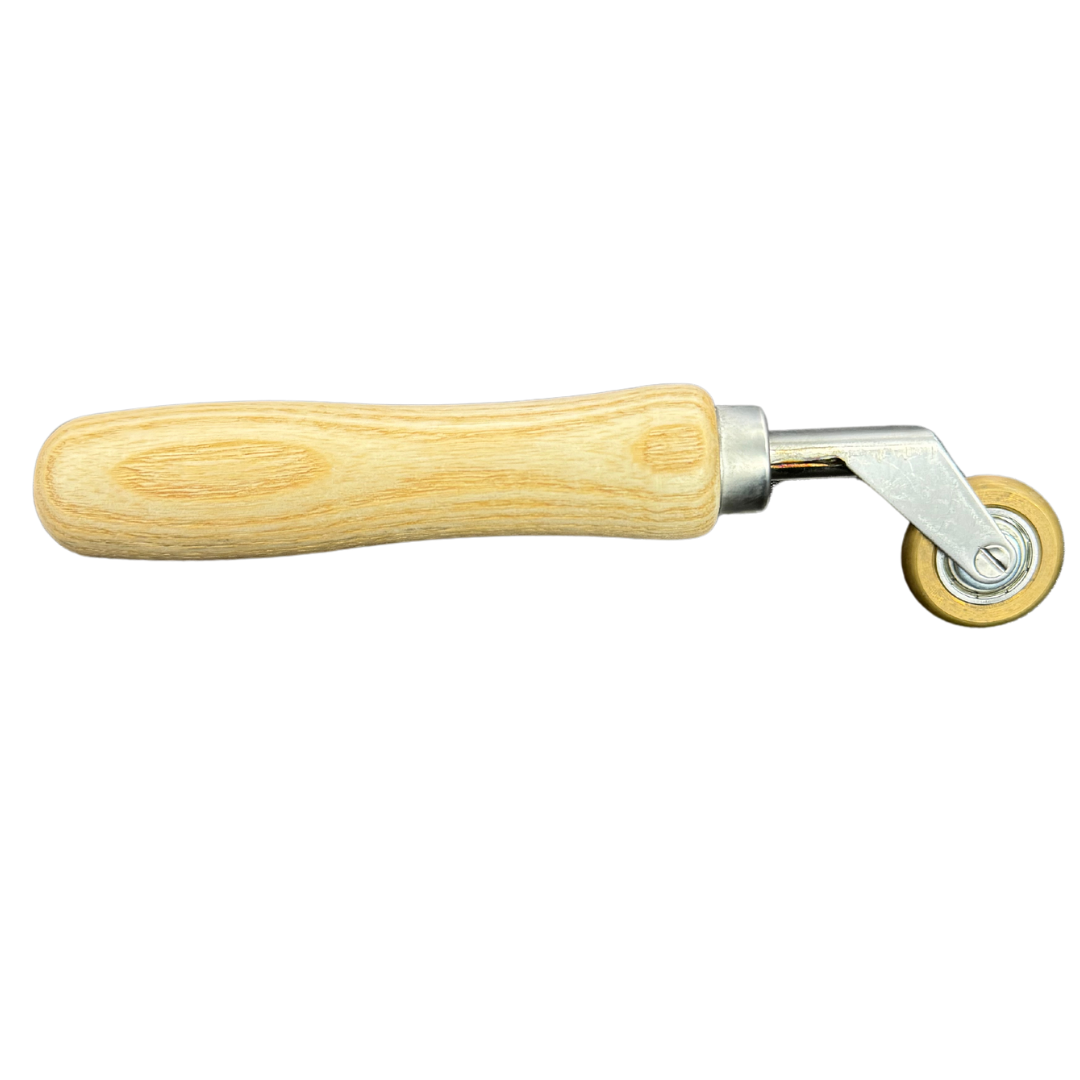 Forspec Penny Roller with wooden handle for applying pressure to waterproofing membranes, tapes and seam joints.