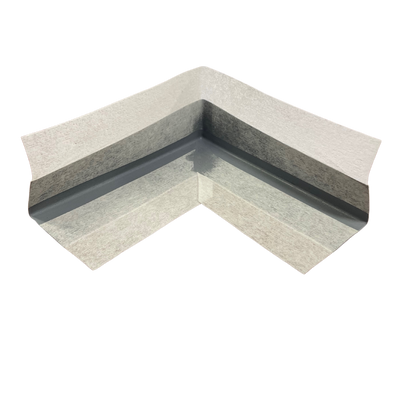 Preformed internal waterproofing corner with a flexible rubber centre and non-woven fleece backing, designed to reinforce internal wall and floor junctions, movement joints, and corners in waterproofing membrane systems.