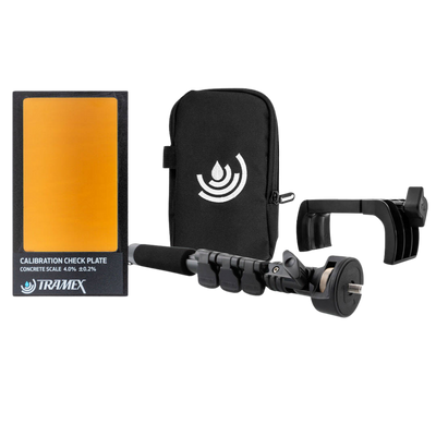 Tramex accessory pack for CME5 and CMEX5 moisture meters, including calibration check plate, protective carry case, extension handle and wall bracket for accurate moisture testing and equipment storage.