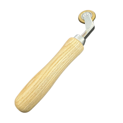 Forspec Penny Roller with wooden handle for applying pressure to waterproofing membranes, tapes and seam joints.